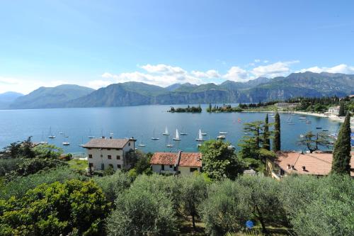 a view of a lake with boats in it at Appartamenti Belvedere in Malcesine