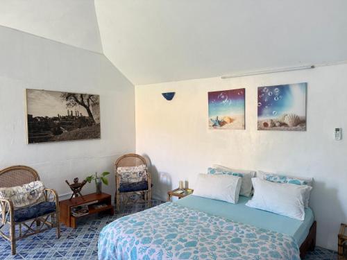 Postel nebo postele na pokoji v ubytování Studio La Casa Azzura
