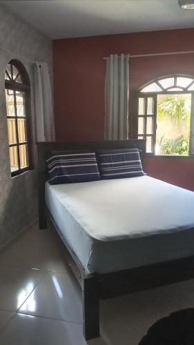 En eller flere senge i et værelse på Casa temporada