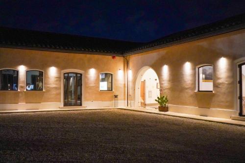 an empty courtyard of a house at night at Borgo Pallavicini Mori in Prima Porta