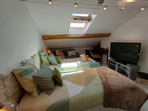 Ένα ή περισσότερα κρεβάτια σε δωμάτιο στο les Métras