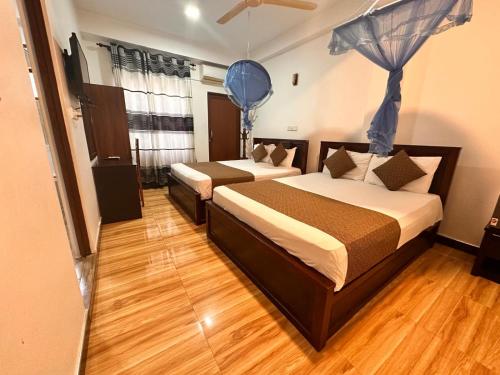 Postel nebo postele na pokoji v ubytování Holiday Villa