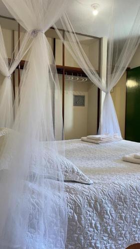 Katil atau katil-katil dalam bilik di Casa B&B