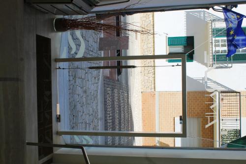a view of a city from a window at Hotel Amyclae in Sperlonga