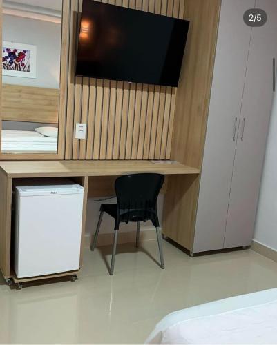TV a/nebo společenská místnost v ubytování Augusto Palace Hotel