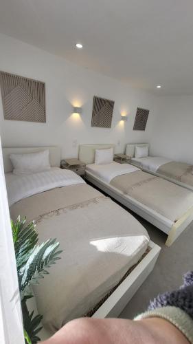 Katil atau katil-katil dalam bilik di Maison Design