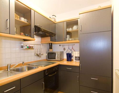 Kuchyň nebo kuchyňský kout v ubytování Fewo-Harlachberg-Blick-1