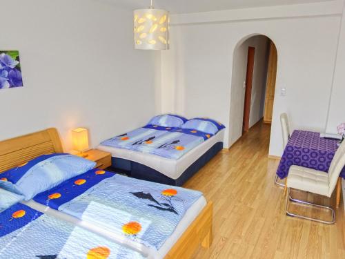 Posteľ alebo postele v izbe v ubytovaní Frühstückspension See-Panorama