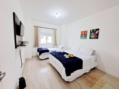 Ένα ή περισσότερα κρεβάτια σε δωμάτιο στο Duplex c/ lareira nas montanhas