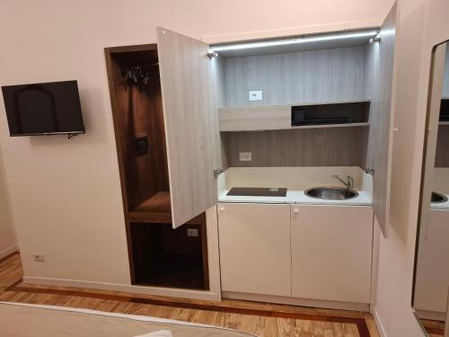 Kuchyň nebo kuchyňský kout v ubytování Amelie Suite Trevi