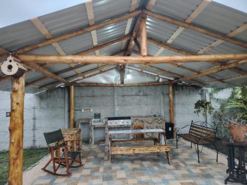 Un patio o zona al aire libre en Cabaña la Corteza