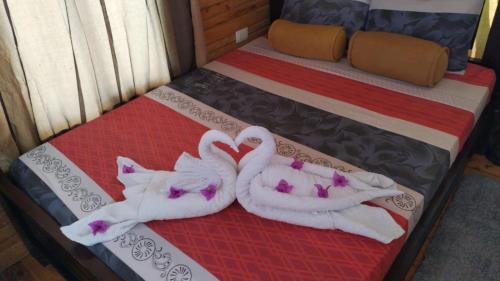 Cama o camas de una habitación en Cabaña la Corteza