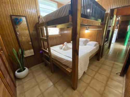 Llit o llits en una habitació de Hacienda Rolón