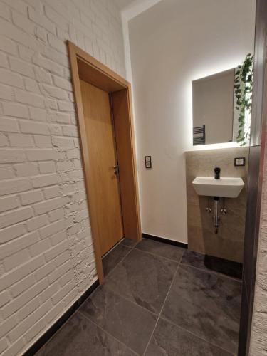 a bathroom with a sink and a mirror at Magisches Wachstein in Wachstein