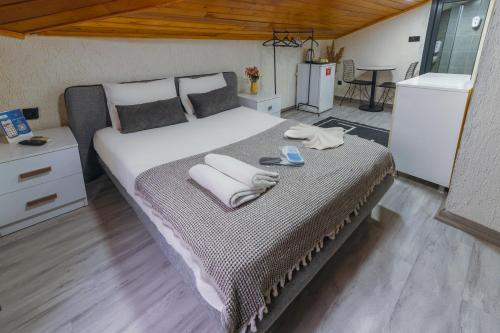 Postel nebo postele na pokoji v ubytování Nest HOTEL Sisli