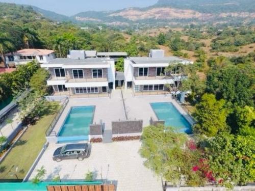 Бассейн в Casa King & Casa Queen Villas или поблизости