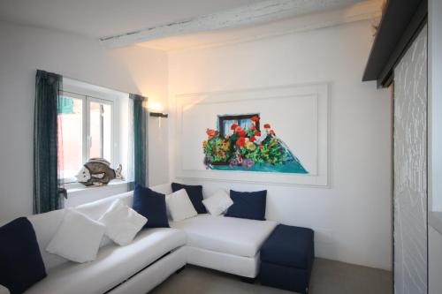 Ένα ή περισσότερα κρεβάτια σε δωμάτιο στο Portofino's Cozy Terrace