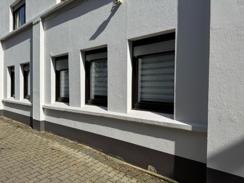 a row of windows on the side of a building at Beethoven Apartments in Solingen