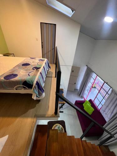 Postel nebo postele na pokoji v ubytování apartaestudios las astromelias salento