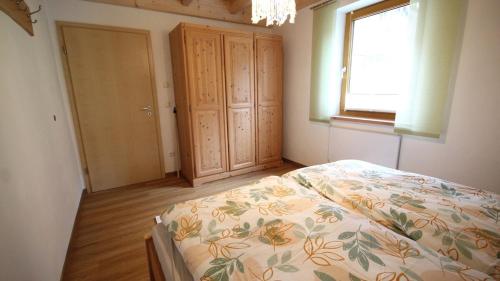 Кровать или кровати в номере Idyllisches Häuschen im Grünen