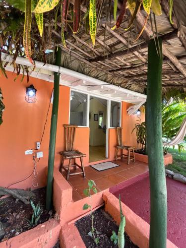 a view of the front porch of a house at Arena Oceanview Hotel & La Terraza Restaurant in Las Galeras