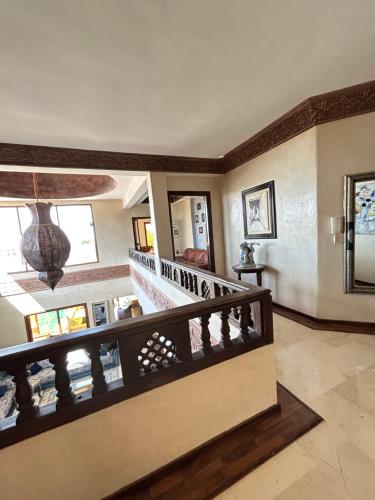 a staircase in a house with a stair case at Amlkis golf royal in Marrakech