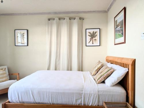Llit o llits en una habitació de 5 Seawinds