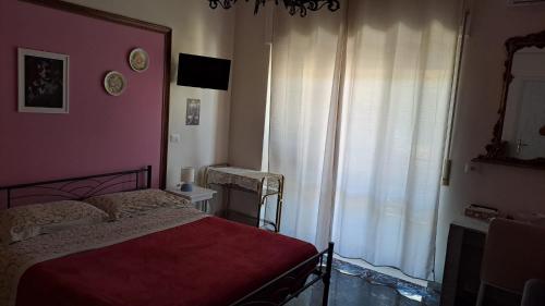 Postel nebo postele na pokoji v ubytování La Camera sul Mare