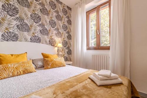 Ένα ή περισσότερα κρεβάτια σε δωμάτιο στο Blue Como Luxury APT #2