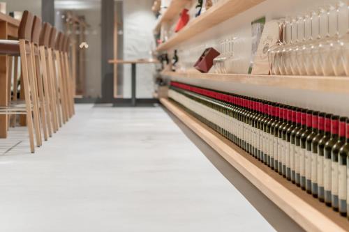 a row of tables and chairs in a store at Alpenhotel Krone in Pfronten