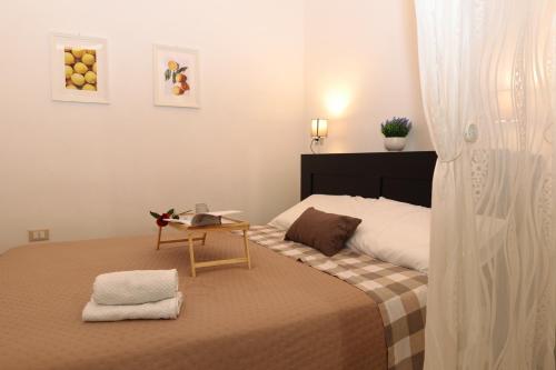 Ένα ή περισσότερα κρεβάτια σε δωμάτιο στο Moire Apulian Apartment