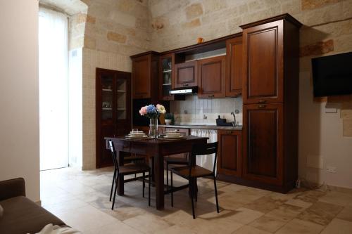 Η κουζίνα ή μικρή κουζίνα στο Moire Apulian Apartment