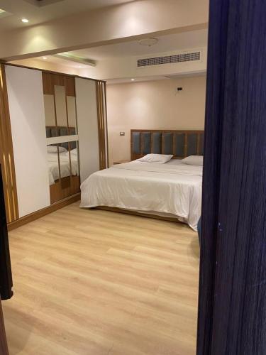 Cama o camas de una habitación en Aw Suites