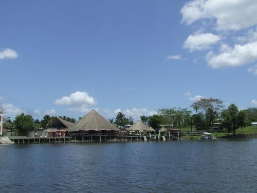 a view of a resort with a large body of water at Lamanai Hotel & Marina in Orange Walk