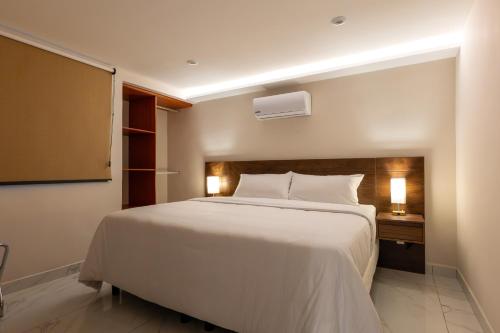 Postel nebo postele na pokoji v ubytování Hotel 28 Cancun