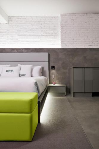 Postel nebo postele na pokoji v ubytování David Hotel
