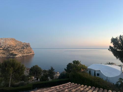 a view of the ocean from a house at Villa with amazing sea views in Port d’Andratx