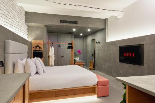 Postel nebo postele na pokoji v ubytování David Hotel