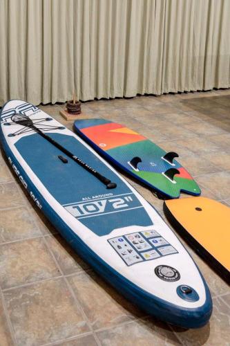 two surfboards sitting on top of a floor at The Lookout Retreat in Anglesea