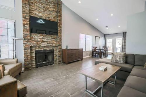 a living room with a couch and a fireplace at What you need A Hidden Gem in the Heart of Vegas in Las Vegas
