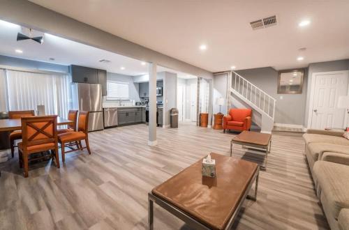 a living room with a couch and a table at Luxury Living Just Steps from the Strip in Las Vegas