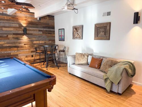 a living room with a couch and a table at Updated Cabin near Beach&Ski HotTub Sauna Pets EV in Tahoe City