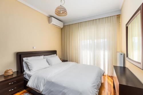 Ένα ή περισσότερα κρεβάτια σε δωμάτιο στο yOUR Apartement
