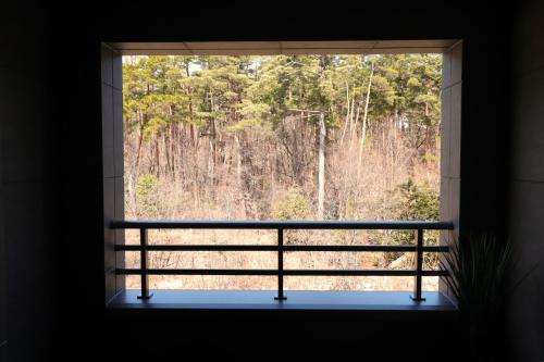 Un balcón o terraza en 温泉ホテル安曇野アートキャビン