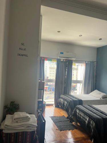 Llit o llits en una habitació de corazón obelisco 1
