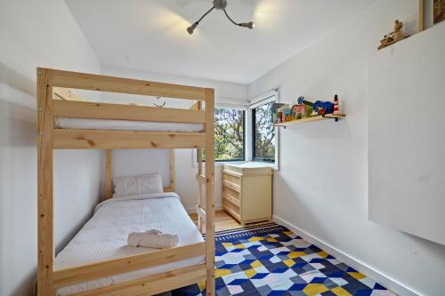 Ένα ή περισσότερα κρεβάτια σε δωμάτιο στο Seaview Retreat