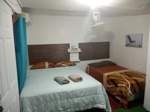 Postel nebo postele na pokoji v ubytování Hotel Victoria s Beach House