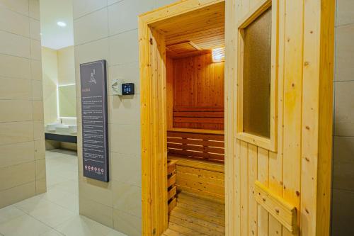 a small bathroom with a sauna in a building at The Atrium at Jalan Ampang by OKBnB - Classy 3Bedroom Family Suite nearby KLCC , TRX and Pavilion KL in Kuala Lumpur