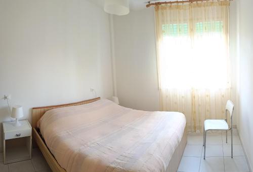 Postel nebo postele na pokoji v ubytování Lido degli Estensi - condominio Ravenna