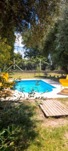 Πισίνα στο ή κοντά στο Olivos Cabañas